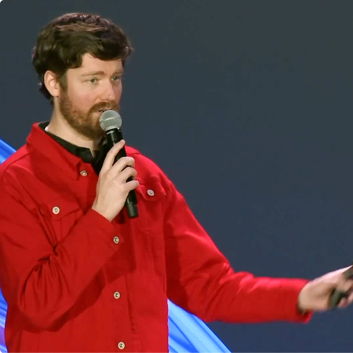 Derek Reese calling you to action in his red jacket.